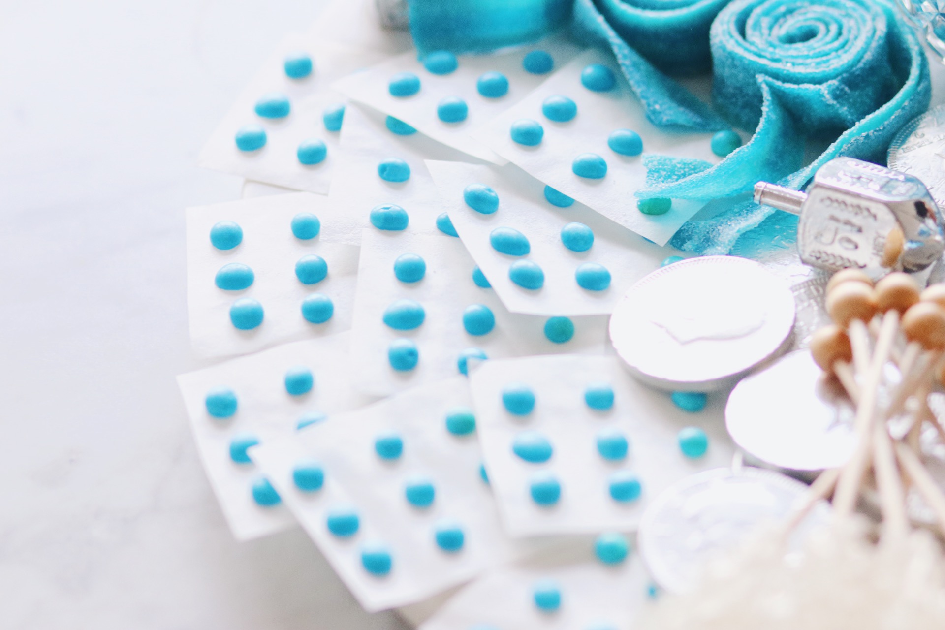How to Put Together a Blue & White Candy Board for Hanukkah - Rebekah Lowin